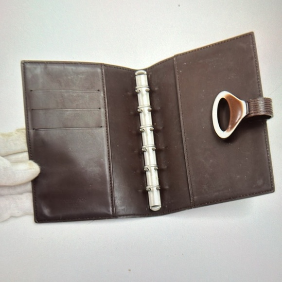 Vintage Louis Vuitton Moka Brown Epi
Leather Agenda Cover PM
Condition: Great - Picture 10 of 16